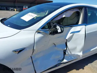 2017 Tesla Model S 100D with VIN 5YJSA1E23HF189813, listed as a IAAI auction lot 41767079 with 53,541 mi miles. Bid and sale history available at carsss.com. Image 6.