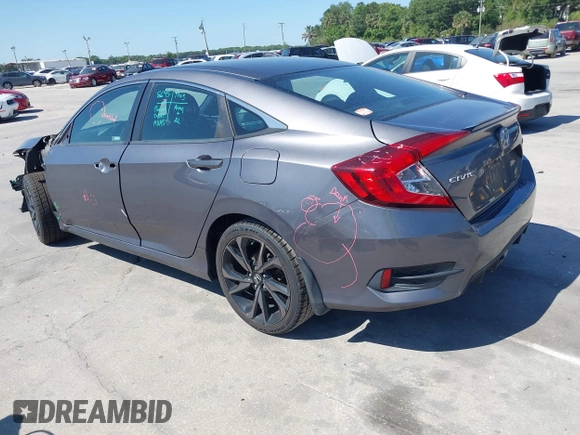 2019 Honda Civic Sport with VIN 19XFC2F89KE019683, listed as a IAAI auction lot 42055871 with 107,941 mi miles and . Bid and sale history available at DreamBid. Image 3.