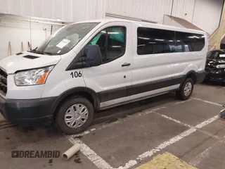2019 Ford Transit Passenger XL with VIN 1FBZX2ZM8KKB24761, listed as a IAAI auction lot 40978107 with 153,669 mi miles. Bid and sale history available at carsss.com. Image 2.