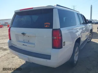 2016 Chevrolet Suburban LT with VIN 1GNSKHKC9GR410334, listed as a IAAI auction lot 41770867 with 168,257 mi miles. Bid and sale history available at carsss.com. Image 4.