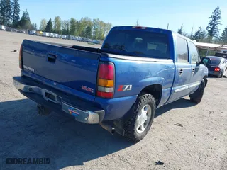 2004 GMC Sierra 1500 Crew Cab SLE with VIN 2GTEK13TX41394077, listed as a IAAI auction lot 42047304 with 227,296 mi miles. Bid and sale history available at carsss.com. Image 4.