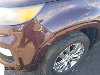 2011 Kia Sorento SX with VIN 5XYKW4A27BG163580, listed as a IAAI auction lot 41987362 with 172,097 mi miles. Bid and sale history available at carsss.com. Image 6.
