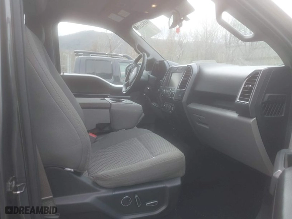 2015 Ford F-150 XLT w/HD Payload Pkg with VIN 1FTFW1EG6FFA46006, listed as a IAAI auction lot 41942359 with 144,221 mi miles. Bid and sale history available at carsss.com. Image 5.