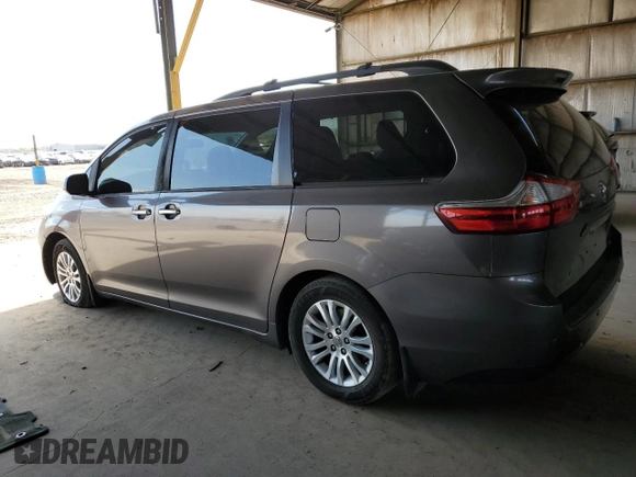 2016 Toyota Sienna XLE with VIN 5TDYK3DC5GS745451, listed as a Copart auction lot 63852525 with 161,578 mi miles and Salvage title. Bid and sale history available at DreamBid. Image 2.