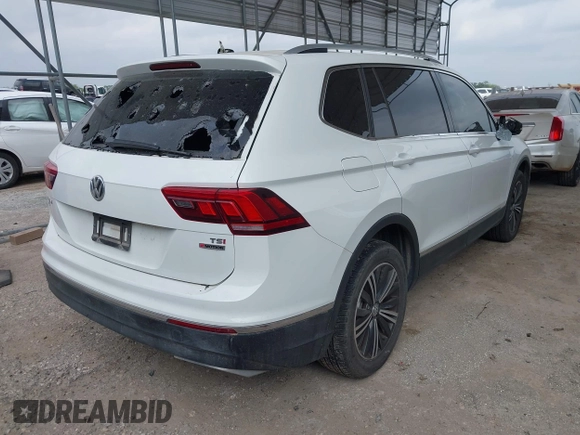 2018 Volkswagen Tiguan SEL with VIN 3VV2B7AX8JM120443, listed as a IAAI auction lot 42154773 with 70,256 mi miles and . Bid and sale history available at DreamBid. Image 4.