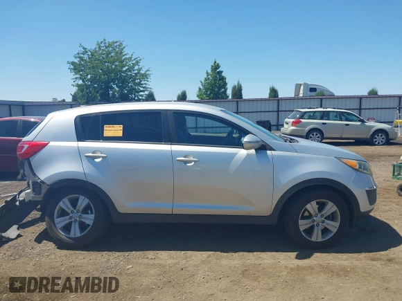 2013 Kia Sportage LX with VIN KNDPBCA24D7352828, listed as a IAAI auction lot 42685744 with 156,805 mi miles and . Bid and sale history available at DreamBid. Image 13.