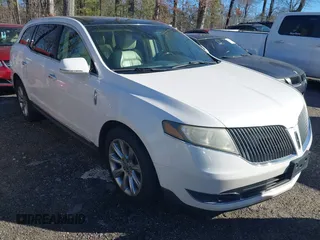 2014 Lincoln MKT EcoBoost with VIN 2LMHJ5ATXEBL53521, listed as a IAAI auction lot 41581330 with 302,604 mi miles and . Bid and sale history available at DreamBid. Image 1.