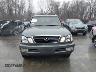 2002 Lexus LX 470 with VIN JTJHT00W923515897, listed as a IAAI auction lot 41155492 with 244,619 mi miles. Bid and sale history available at carsss.com. Image 12.
