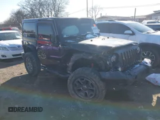 2012 Jeep Wrangler Rubicon with VIN 1C4BJWCG6CL268605, listed as a IAAI auction lot 41618418 with 117,668 mi miles and . Bid and sale history available at DreamBid. Image 1.