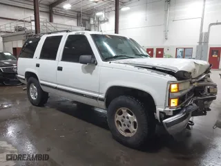 1996 Chevrolet Tahoe with VIN 1GNEK13R5TJ341299, listed as a IAAI auction lot 41713489 with 251,990 mi miles. Bid and sale history available at carsss.com. Image 1.