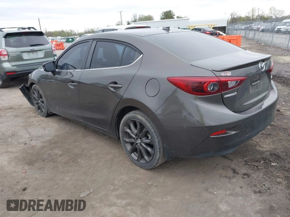 2014 Mazda 3 S Grand Touring with VIN JM1BM1W39E1145186, listed as a IAAI auction lot 41948404 with 111,702 mi miles and . Bid and sale history available at DreamBid. Image 3.