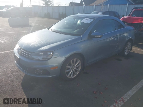2012 Volkswagen Eos Komfort with VIN WVWBW7AH1CV022066, listed as a IAAI auction lot 41950391 with 98,877 mi miles and . Bid and sale history available at DreamBid. Image 2.