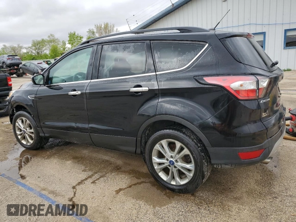 2018 Ford Escape SE z VIN 1FMCU9GD4JUA95666, wystawiony jako Copart lot #55767485 z przebiegiem 60 743 mil mil oraz Nie do naprawy • Non repairable. Historia ofert i sprzedaży dostępna na DreamBid. Obrazek 2.