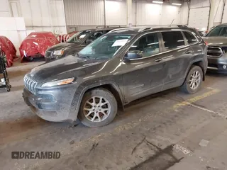 2014 Jeep Cherokee Latitude with VIN 1C4PJMCS4EW272815, listed as a IAAI auction lot 41616504 with 97,613 mi miles and . Bid and sale history available at carsss.com. Image 17.