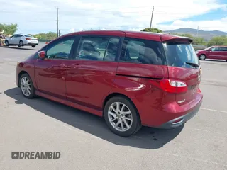 2012 Mazda 5 Touring with VIN JM1CW2CLXC0113181, listed as a IAAI auction lot 42653061 with 94,441 mi miles and . Bid and sale history available at DreamBid. Image 3.