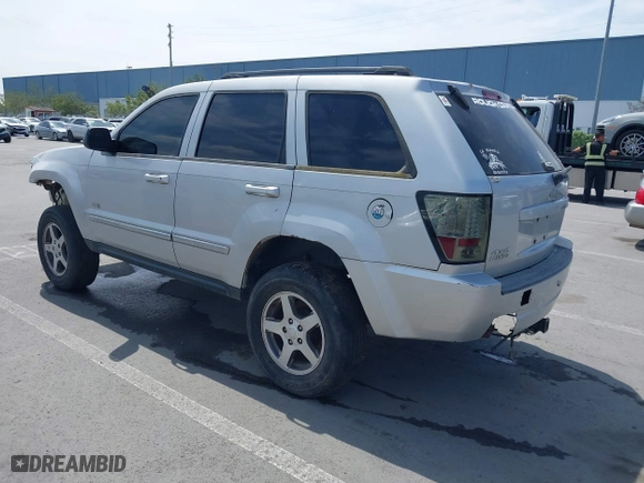 2006 Jeep Grand Cherokee Laredo with VIN 1J4GR48K46C308811, listed as a IAAI auction lot 42044167 with 190,613 mi miles. Bid and sale history available at carsss.com. Image 3.