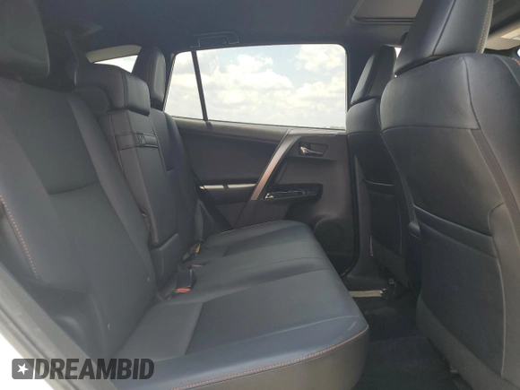2018 Toyota RAV4 Hybrid SE with VIN JTMJJREVXJD212926, listed as a Copart auction lot 60215465 with 71,876 mi miles and Salvage title. Bid and sale history available at DreamBid. Image 11.