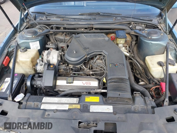 1986 Cadillac Seville z VIN 1G6KS6989GU813079, wystawiony jako IAAI lot #41732353 z przebiegiem Nie podano mil oraz . Historia ofert i sprzedaży dostępna na DreamBid. Obrazek 10.