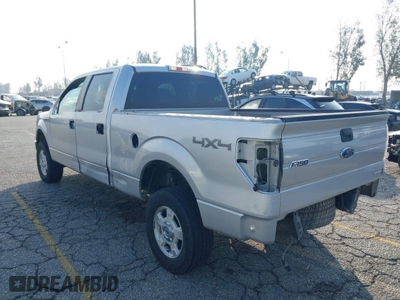 2014 Ford F-150 XL with VIN 1FTFW1EF9EKF99892, listed as a IAAI auction lot 41428456 with 128,659 mi miles and . Bid and sale history available at carsss.com. Image 3.