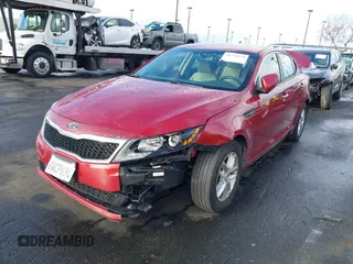 2012 Kia Optima LX with VIN 5XXGM4A70CG070980, listed as a IAAI auction lot 41744124 with 158,355 mi miles and . Bid and sale history available at carsss.com. Image 2.