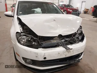 2012 Volkswagen Golf TDI z VIN WVWDM7AJ9CW296921, wystawiony jako IAAI lot #42070028 z przebiegiem 113 511 mil mil oraz . Historia ofert i sprzedaży dostępna na DreamBid. Obrazek 6.