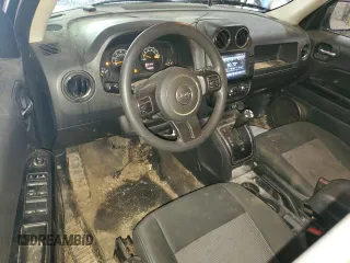 2015 Jeep Patriot Sport with VIN 1C4NJRBB5FD240460, listed as a Copart auction lot 54054755 with 148,502 mi miles and Salvage title. Bid and sale history available at DreamBid. Image 8.