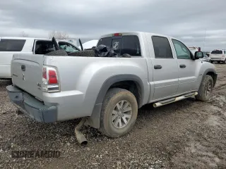 2006 Mitsubishi Raider Duro Cross with VIN 1Z7HC38N76S560403, listed as a Copart auction lot 42801925 with 197,423 mi miles and Salvage Title. Bid and sale history available at carsss.com. Image 3.