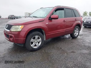 2006 Suzuki Grand Vitara Premium z VIN JS3TD943864103101, wystawiony jako IAAI lot #42322528 z przebiegiem 184 503 mil mil oraz . Historia ofert i sprzedaży dostępna na DreamBid. Obrazek 2.