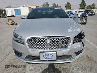 2018 Lincoln MKZ Reserve с VIN 3LN6L5FC7JR607221, выставлен на аукционе Copart как лот 57636675 с пробегом 80 396 миль миль и Списание • Salvage title. История ставок и продаж доступна на DreamBid. Изображение 5.