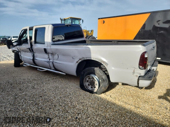 2005 Ford F-350 XL с VIN 1FTWW31P75EB69657, выставлен на аукционе Copart как лот 59414615 с пробегом 100 265 миль миль и Списание • Salvage title. История ставок и продаж доступна на DreamBid. Изображение 2.