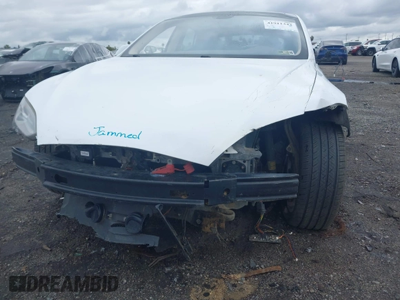 2013 Tesla Model S с VIN 5YJSA1CN0DFP31750, выставлен на аукционе IAAI как лот 41911343 с пробегом 209 664 миль миль и . История ставок и продаж доступна на DreamBid. Изображение 6.