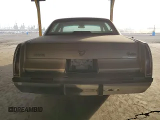1994 Cadillac Fleetwood z VIN 1G6DW52P2RR716708, wystawiony jako Copart lot #86538194 z przebiegiem Nie podano mil oraz Czysty tytuł • Clean title. Historia ofert i sprzedaży dostępna na DreamBid. Obrazek 6.