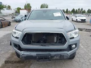 2021 Toyota Tacoma SR z VIN 3TMCZ5AN1MM422937, wystawiony jako IAAI lot #42067866 z przebiegiem 33 232 mil mil oraz . Historia ofert i sprzedaży dostępna na DreamBid. Obrazek 12.