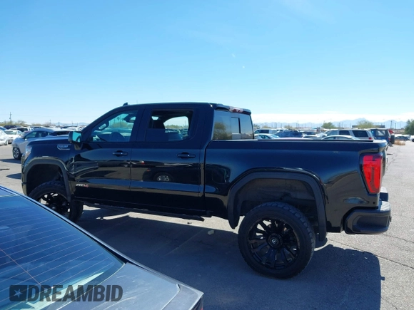 2021 GMC Sierra 1500 AT4 with VIN 3GTP9EED5MG206008, listed as a IAAI auction lot 41665423 with 61,685 mi miles. Bid and sale history available at carsss.com. Image 15.