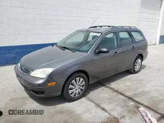2006 Ford Focus SE with VIN 1FAHP36N56W223049, listed as a Copart auction lot 61211745 with 185,609 mi miles and Salvage title. Bid and sale history available at DreamBid. Image 1.