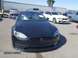 2022 Tesla Model S Plaid with VIN 5YJSA1E62NF460634, listed as a IAAI auction lot 41372644 with 16,050 mi miles and . Bid and sale history available at DreamBid. Image 12.