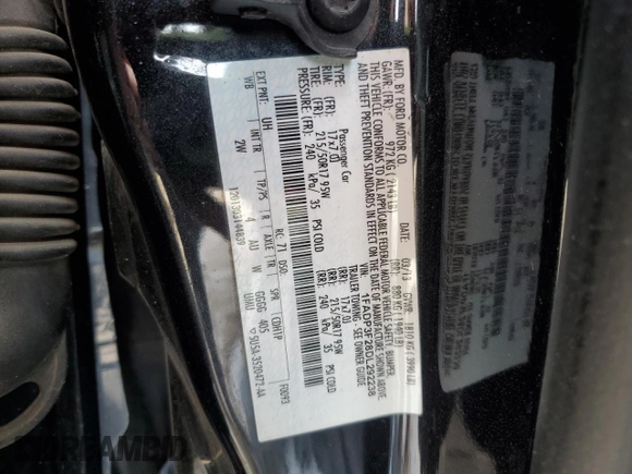 2013 Ford Focus SE z VIN 1FADP3F28DL292238, wystawiony jako Copart lot #51016715 z przebiegiem 165 699 mil mil oraz Szkoda całkowita • Salvage title. Historia ofert i sprzedaży dostępna na DreamBid. Obrazek 12.