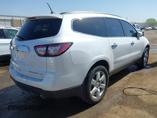2016 Chevrolet Traverse LTZ z VIN 1GNKRJKDXGJ265413, wystawiony jako IAAI lot #42001292 z przebiegiem 157 129 mil mil oraz . Historia ofert i sprzedaży dostępna na DreamBid. Obrazek 4.