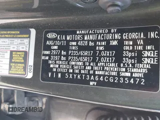 2012 Kia Sorento LX with VIN 5XYKT3A64CG235472, listed as a IAAI auction lot 41983480 with 213,338 mi miles. Bid and sale history available at carsss.com. Image 9.