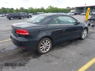 2015 Volkswagen Eos Komfort with VIN WVWBW8AH5FV004034, listed as a IAAI auction lot 41981978 with 106,450 mi miles and . Bid and sale history available at DreamBid. Image 4.