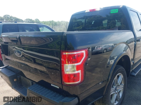 2018 Ford F-150 XL with VIN 1FTEW1EP2JFD51393, listed as a IAAI auction lot 42307408 with 141,478 mi miles and . Bid and sale history available at DreamBid. Image 4.
