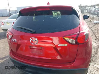 2016 Mazda CX-5 Sport with VIN JM3KE2BY3G0754391, listed as a IAAI auction lot 41719461 with 79,130 mi miles. Bid and sale history available at carsss.com. Image 16.