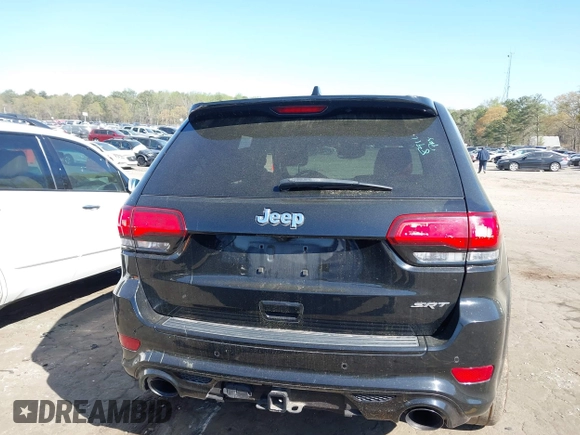2017 Jeep Grand Cherokee SRT with VIN 1C4RJFDJ2HC696025, listed as a IAAI auction lot 41863274 with 126,949 mi miles. Bid and sale history available at carsss.com. Image 16.