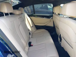 2019 BMW 5 Series 530e iPerformance with VIN WBAJA9C59KB389898, listed as a IAAI auction lot 41479595 with 90,965 mi miles. Bid and sale history available at carsss.com. Image 8.