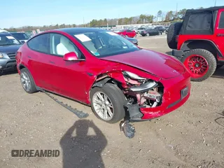 2020 Tesla Model Y Long Range z VIN 5YJYGDEE0LF020037, wystawiony jako IAAI lot #41770449 z przebiegiem 35 849 mil mil oraz . Historia ofert i sprzedaży dostępna na DreamBid. Obrazek 1.