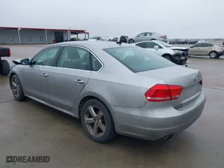 2014 Volkswagen Passat Wolfsburg Ed with VIN 1VWAT7A32EC028320, listed as a IAAI auction lot 41456457 with 173,581 mi miles. Bid and sale history available at carsss.com. Image 3.