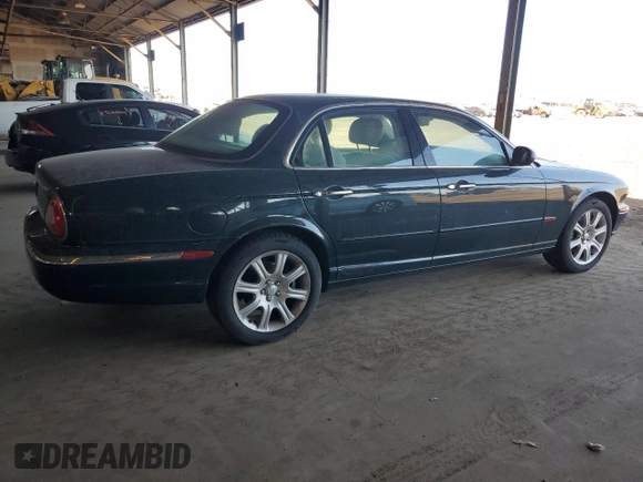 2004 Jaguar XJ with VIN SAJWA71C04SG20211, listed as a Copart auction lot 78713334 with 43,169 mi miles and Clean Title. Bid and sale history available at carsss.com. Image 3.