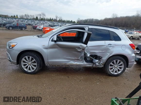 2011 Mitsubishi Outlander SE z VIN JA4AP4AU6BZ018195, wystawiony jako IAAI lot #41909830 z przebiegiem 68 576 mil mil oraz . Historia ofert i sprzedaży dostępna na DreamBid. Obrazek 14.