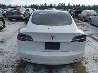 2020 Tesla Model 3 Standard Range Plus with VIN 5YJ3E1EA7LF742973, listed as a IAAI auction lot 41409285 with 48,993 mi miles and . Bid and sale history available at DreamBid. Image 16.