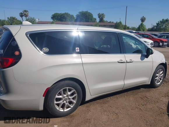 2017 Chrysler Pacifica Touring with VIN 2C4RC1DG6HR633826, listed as a IAAI auction lot 42170041 with 143,481 mi miles and . Bid and sale history available at DreamBid. Image 13.